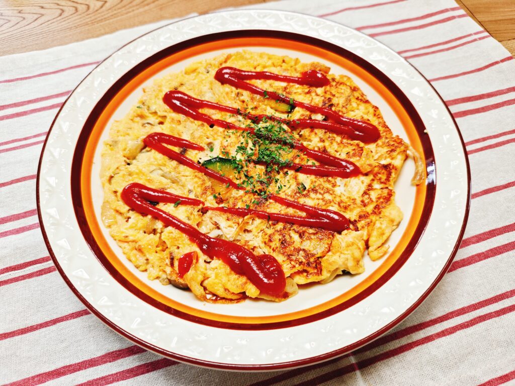 社食惣菜アレンジレシピ「トラウトサーモンと野菜のキッシュ風オムレツ」
